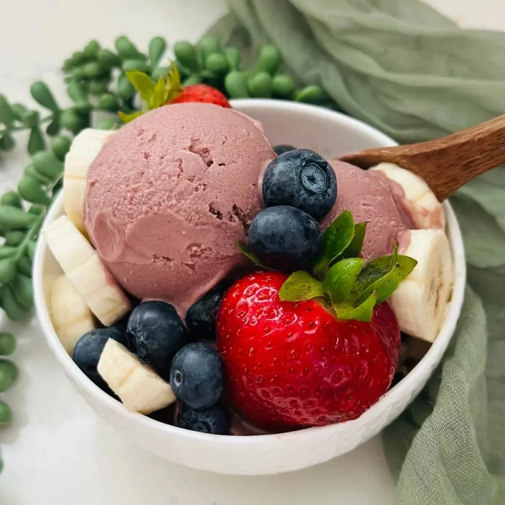 Delicious Açaí Bowl made with Ninja Creami, topped with fresh fruits and granola.