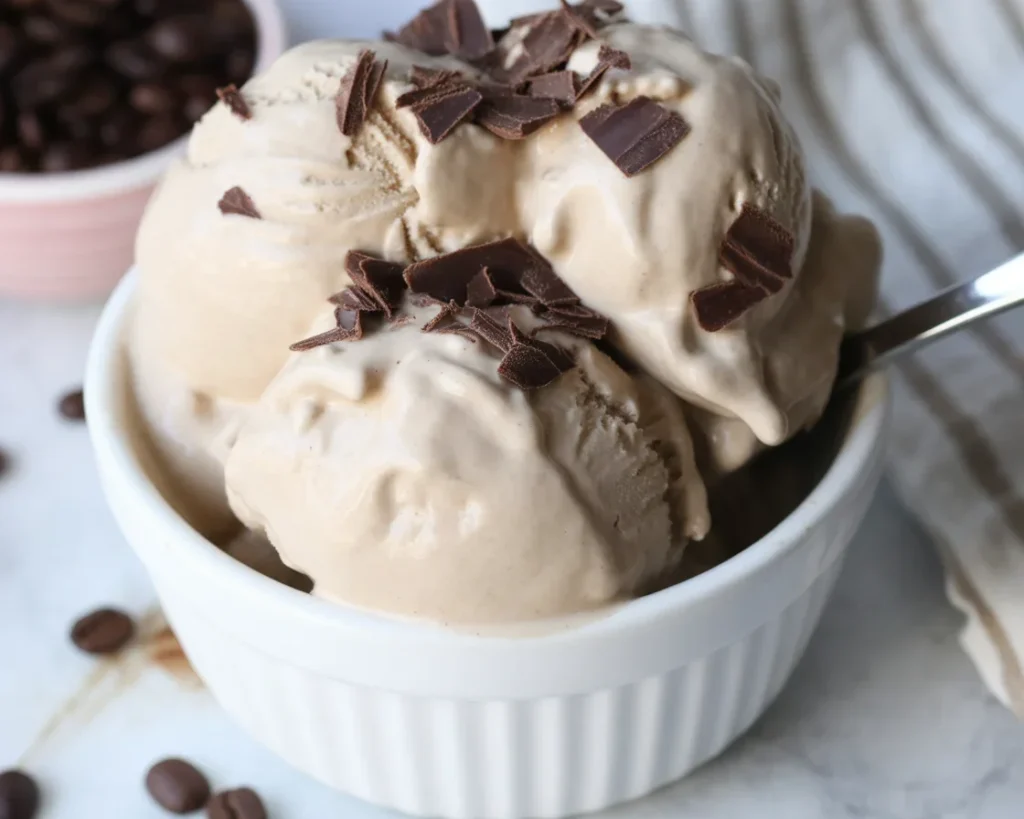 Homemade Ninja Creami coffee ice cream with just four ingredients served in a bowl