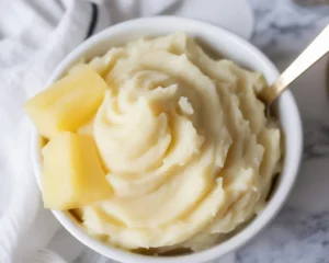 Delicious Ninja Creami Dole Whip served in a bowl topped with a swirl.