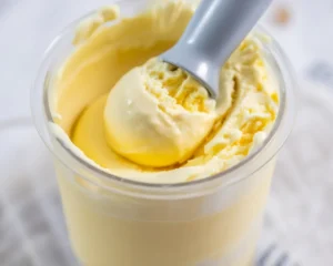 Delicious Ninja Creami Eggnog Ice Cream topped with nutmeg and cinnamon.