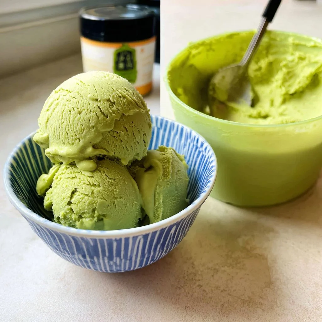 Bowl of creamy Coconut Matcha Ice Cream garnished with mint leaves and coconut flakes