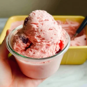 Delicious bowl of homemade Cherry Ice Cream made with Ninja Creami.