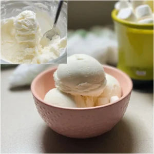 Homemade Ninja Creami marshmallow ice cream in a bowl with toppings.