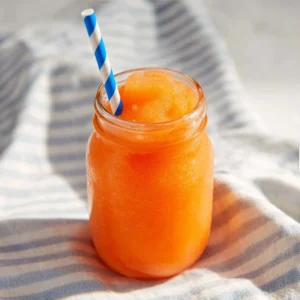 Refreshing Ninja Slushi Orange Soda Slush in a vibrant glass