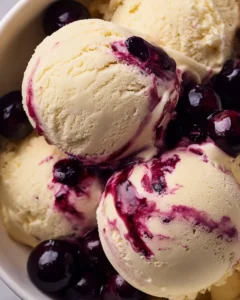 Homemade black cherry ice cream made with Ninja Creami machine