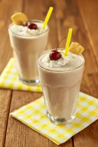 Delicious Milkshake Cherry Tart topped with cherries and whipped cream