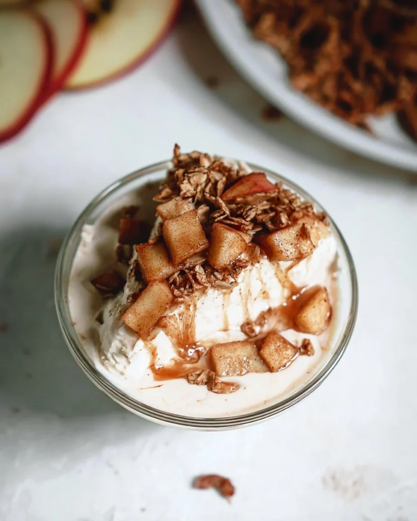Protein ice cream apple pie topped with cinnamon and whipped cream