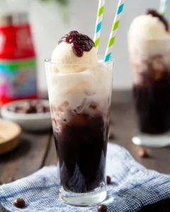 Delicious red bean ice topped with creamy ice cream in a vibrant bowl