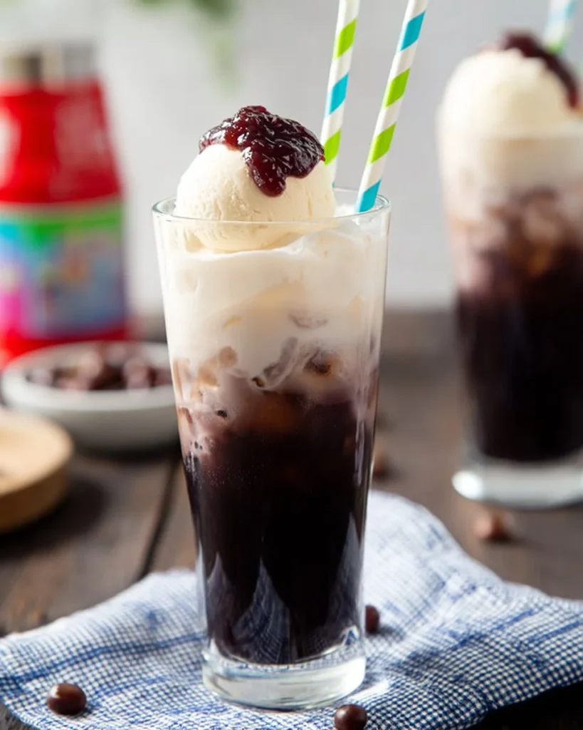 Delicious red bean ice topped with creamy ice cream in a vibrant bowl